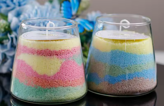 Velas de cera perladas de colores arena